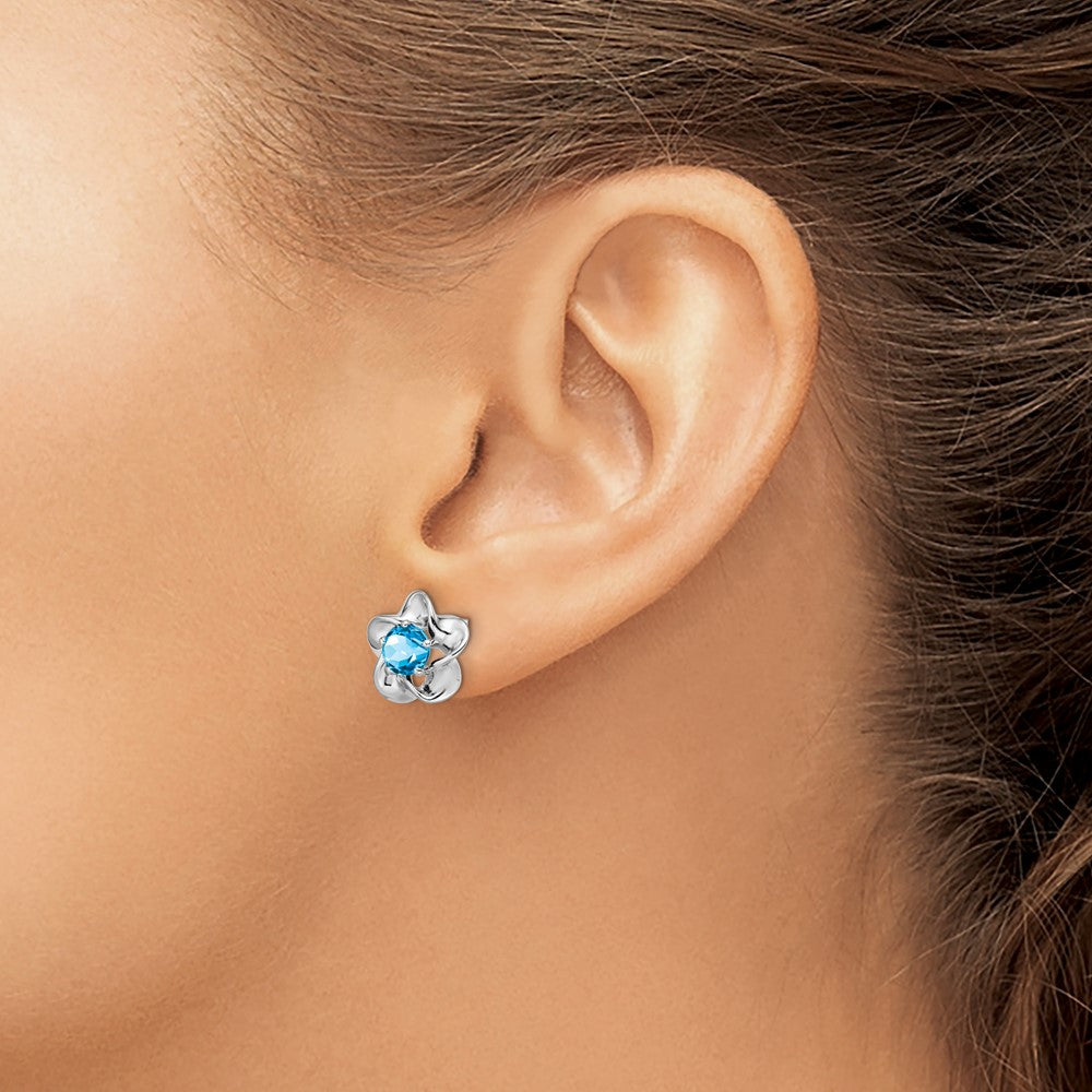 Rhodium-plated Sterling Silver Floral Blue Topaz Post Earrings