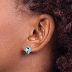 Rhodium-plated Sterling Silver Blue Topaz and White CZ Earrings