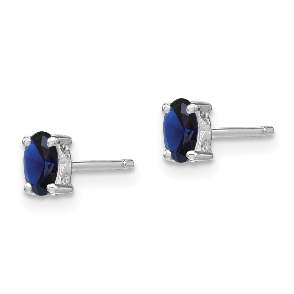 Rhodium-plated Sterling Silver 5x3mm Oval Created Sapphire Post Earrings