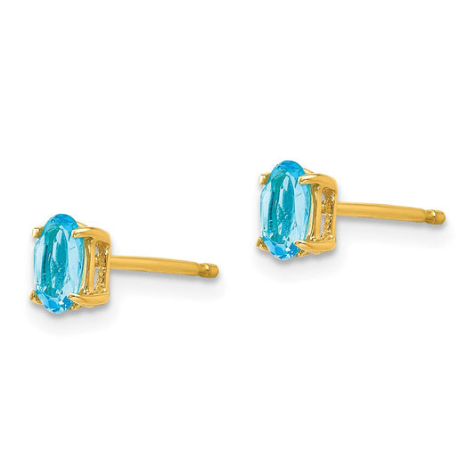 14K Yellow Gold 5x3mm Oval Blue Topaz Stud Earrings