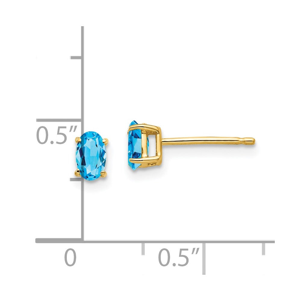 14K Yellow Gold 5x3mm Oval Blue Topaz Stud Earrings