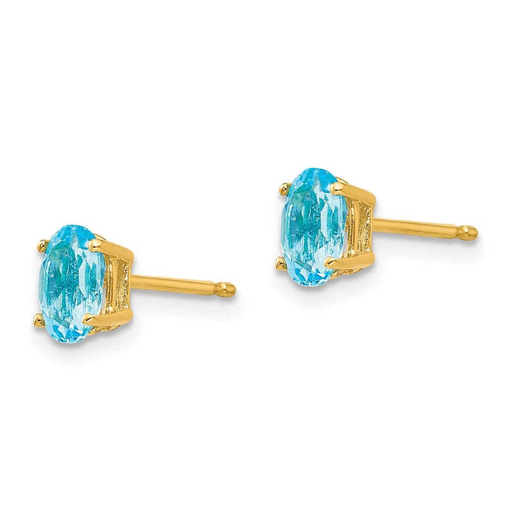 14K Yellow Gold 6x4mm Oval Blue Topaz Stud Earrings