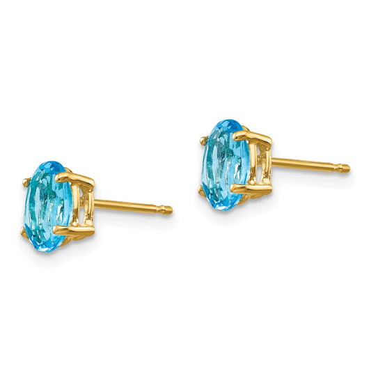 14K Yellow Gold 7x5mm Oval Blue Topaz Stud Earrings